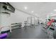 Gym featuring free weights and wall-mounted TV at 11 Perimeter E Ctr # 1115, Atlanta, GA 30346