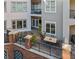 This condo has a brick patio with a dining table and chairs that overlook the beautiful courtyard at 11 Perimeter E Ctr # 1115, Atlanta, GA 30346