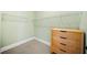 Walk-in closet features carpet and storage shelving at 11 Perimeter E Ctr # 1115, Atlanta, GA 30346