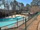 Inviting community pool area featuring pergolas and a sun deck, perfect for relaxation at 1401 Riverview Se Dr # 1401, Marietta, GA 30067