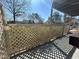 Inviting outdoor patio area enclosed by a lattice fence offering a semi-private setting at 1401 Riverview Se Dr # 1401, Marietta, GA 30067