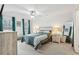 Bedroom features a tray ceiling, ceiling fan, and serene decor for relaxation at 5227 Whiteoak Se Ave, Smyrna, GA 30080