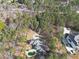 Aerial view of the estate showing backyard pool, house, circular driveway, and trees at 9610 Cedar Grove Rd, Fairburn, GA 30213