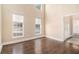 Bright living room boasting hardwood floors and large windows at 9610 Cedar Grove Rd, Fairburn, GA 30213