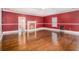 Large living room with hardwood floors, fireplace and a window at 9610 Cedar Grove Rd, Fairburn, GA 30213