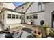 Charming backyard patio area with a built-in grill, lush greenery, and comfortable seating for outdoor enjoyment at 1666 Johnson Ne Rd, Atlanta, GA 30306