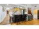 Stylish bar area featuring a black countertop, comfortable seating, and hardwood floors at 1666 Johnson Ne Rd, Atlanta, GA 30306