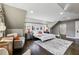 Spacious bedroom featuring hardwood floors, large windows, neutral walls and a soft rug at 1666 Johnson Ne Rd, Atlanta, GA 30306