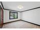 Empty bedroom with a window and carpet at 1666 Johnson Ne Rd, Atlanta, GA 30306