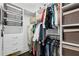 Walk-in closet with white shelving and baskets for storage at 1666 Johnson Ne Rd, Atlanta, GA 30306
