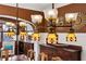 Stylish dining room with beautiful chandelier, built-in cabinets and cozy seating at 1666 Johnson Ne Rd, Atlanta, GA 30306