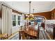 Spacious dining room features a large table, elegant lighting, and a separate seating area at 1666 Johnson Ne Rd, Atlanta, GA 30306