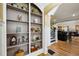 Charming entryway features hardwood floors, a staircase, and a built-in bookcase at 1666 Johnson Ne Rd, Atlanta, GA 30306