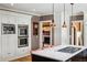 Modern kitchen with stainless steel appliances and a marble countertop island at 1666 Johnson Ne Rd, Atlanta, GA 30306