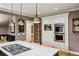 Open kitchen with a center island and marble countertops, complete with stainless steel appliances at 1666 Johnson Ne Rd, Atlanta, GA 30306