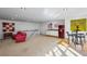 Large living room featuring plush seating, kitchenette, and ample space for entertaining at 1666 Johnson Ne Rd, Atlanta, GA 30306