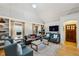 Bright living room with vaulted ceilings, hardwood floors, built-in shelving, and stylish furniture at 1666 Johnson Ne Rd, Atlanta, GA 30306