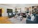 Inviting living room featuring hardwood floors, built-in shelving, and comfortable seating arrangements at 1666 Johnson Ne Rd, Atlanta, GA 30306