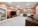 Cozy living room with a large TV, built-in shelves, and comfortable seating at 1666 Johnson Ne Rd, Atlanta, GA 30306