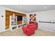 Comfortable living room with an entertainment center, accent wall, and stylish furnishings at 1666 Johnson Ne Rd, Atlanta, GA 30306
