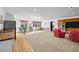 Spacious living room with hardwood and carpet flooring, kitchenette, and natural light at 1666 Johnson Ne Rd, Atlanta, GA 30306