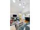 Spacious living room with vaulted ceilings, hardwood floors, and a seamless transition to the bar area at 1666 Johnson Ne Rd, Atlanta, GA 30306