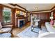 Warm and inviting living room with fireplace and view to the dining room at 1666 Johnson Ne Rd, Atlanta, GA 30306