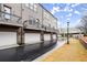 Townhome row showcasing balconies over garages, plus street view at 304 Gibson Se St, Atlanta, GA 30316