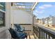 Relaxing balcony offers an overhead pergola with seating and a view of the neighborhood at 4414 Declan Dr, Kennesaw, GA 30144