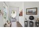 Inviting entryway featuring wood floors, natural light, and decorative art pieces at 4414 Declan Dr, Kennesaw, GA 30144