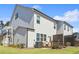 A bright home with fresh landscaping, a small porch, and outdoor dining area at 4414 Declan Dr, Kennesaw, GA 30144