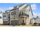 Beautiful two-story home featuring white siding, a balcony, and a two-car garage at 4414 Declan Dr, Kennesaw, GA 30144