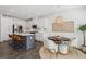Well-appointed kitchen and dining area with modern finishes and ample seating at 4414 Declan Dr, Kennesaw, GA 30144