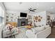 Comfortable living room with built-in shelving, fireplace, and stylish decor at 4414 Declan Dr, Kennesaw, GA 30144