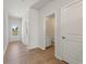 Bright entryway features durable wood-look flooring and leads to various rooms, including a bathroom at 650 Redhead Way (Lot 25), Grayson, GA 30017