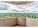 Balcony showcasing stunning panoramic views of lush greenery and distant trees at 1501 Clairmont Rd # 2016, Decatur, GA 30033