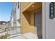 Welcoming front entrance with a covered porch, offering a glimpse of the modern exterior at 1696 Gunnin Nw Trce # 244, Atlanta, GA 30318