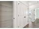 Hallway includes a large shelved storage closet and entry to more rooms at 1696 Gunnin Nw Trce # 244, Atlanta, GA 30318