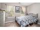 Cozy bedroom featuring two windows for natural light and neutral paint tones at 410 Bowen Ne Rd, White, GA 30184