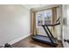 Home exercise room featuring a treadmill and hardwood floors at 100 Daniel Se Ave, Atlanta, GA 30317