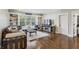 This living area offers hardwood floors, large windows, and built-in shelving, making it an inviting space at 100 Daniel Se Ave, Atlanta, GA 30317