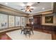 Cozy dining room with ample natural light, built in storage, and neutral decor at 12710 Old Surrey Pl, Roswell, GA 30075