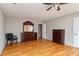 Spacious bedroom featuring hardwood floors and traditional furniture set at 1850 Cashmere Ct, Lithonia, GA 30058