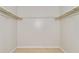 Walk-in closet with tile flooring and built-in shelving and storage at 1850 Cashmere Ct, Lithonia, GA 30058