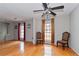 Spacious living room featuring hardwood floors, neutral wall colors, and an open floorplan at 1850 Cashmere Ct, Lithonia, GA 30058