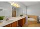 Spacious bathroom features a double vanity, soaking tub, and separate shower at 1126 Park Row South Se, Atlanta, GA 30312