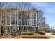 Charming townhome with gray siding, multi-pane windows, and inviting curb appeal at 1126 Park Row South Se, Atlanta, GA 30312