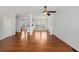 Open living area with hardwood floors and view of kitchen and dining at 1126 Park Row South Se, Atlanta, GA 30312