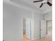 Main bedroom with neutral carpet flooring, ceiling fan, and attached bathroom at 1126 Park Row South Se, Atlanta, GA 30312