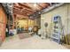 Unfinished basement with exposed ceiling and duct work and concrete flooring at 1331 Ashbury Park Dr, Hoschton, GA 30548